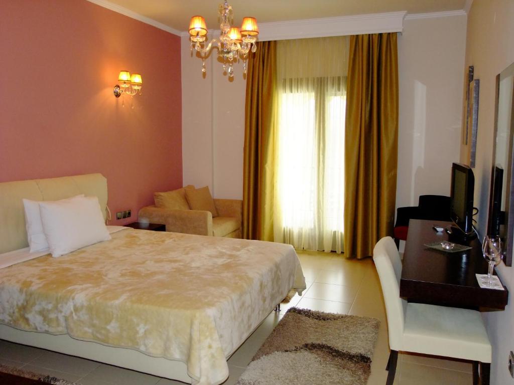 Faraggi Hotel Символи Номер фото